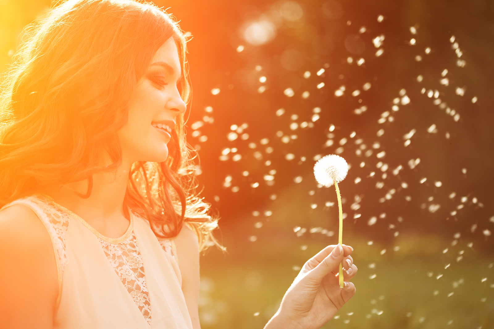 Young Spring Fashion Woman Blowing Dandelion In Spring Garden S Northwest Academy Massage School